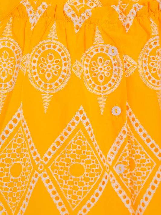Completo in voile giallo ricamato